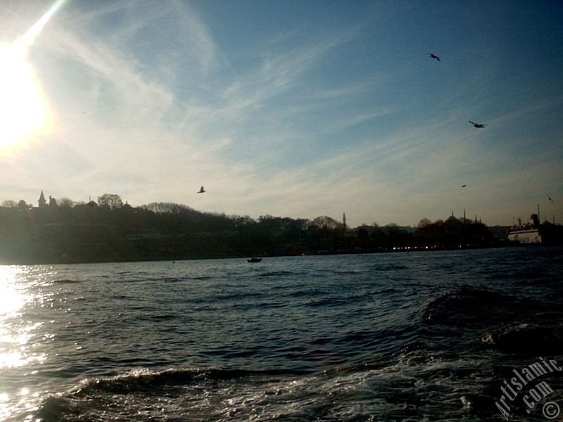 View of Sarayburnu coast, Topkapi Palace, Beyazit Tower and Suleymaniye Mosque from the Bosphorus in Istanbul city of Turkey.
