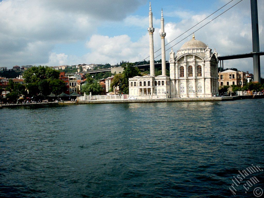 View of Ortakoy coast, Ortakoy Mosque and Bosphorus Bridge from the Bosphorus in Istanbul city of Turkey.
